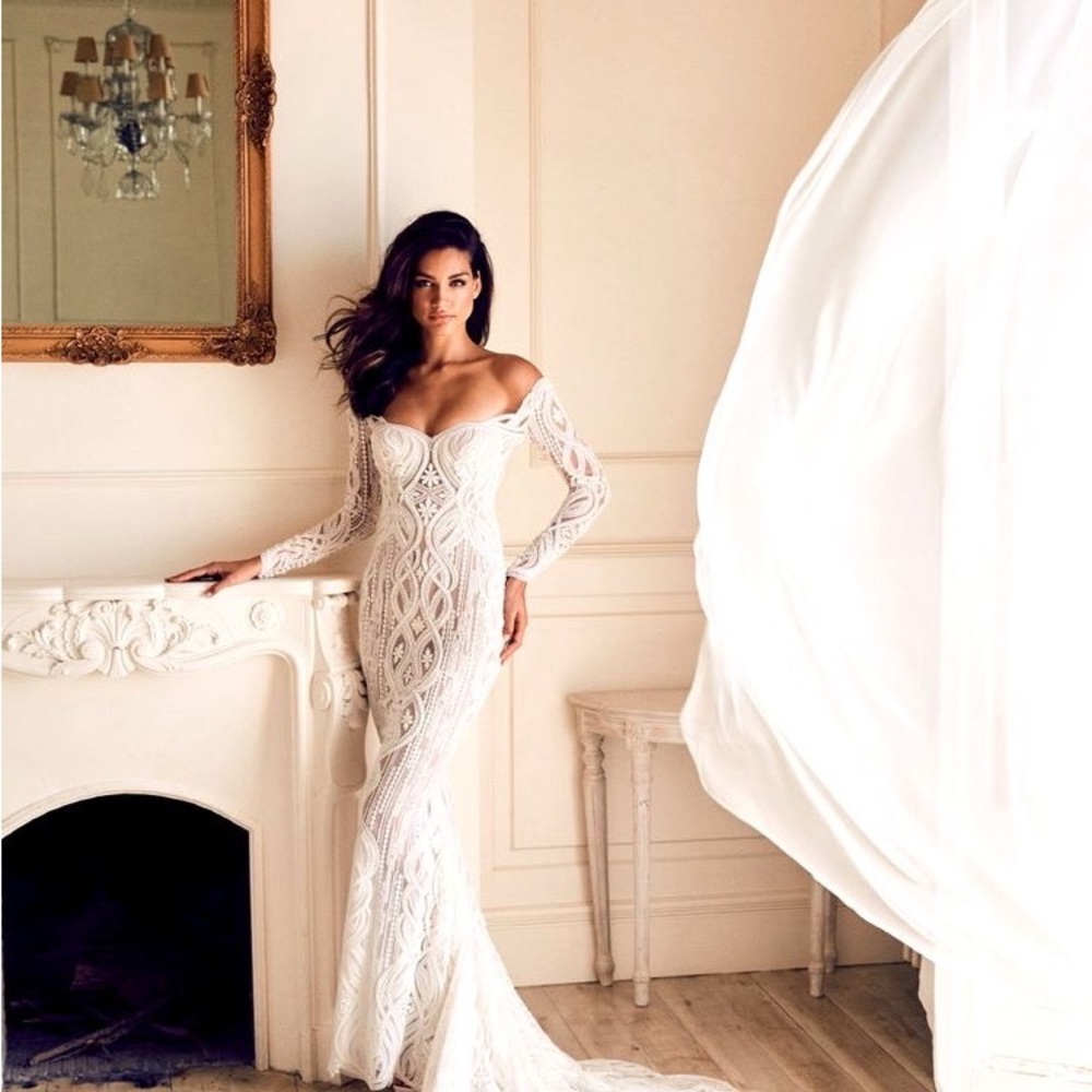 Pre owned pronovias dress gorgeous and fully beaded .